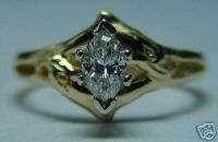   Engagement Ring in14kt. white or yellow Gold 25pt. Marq. Center  