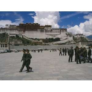Peoples Liberation Army Soldiers Walk in Front of the Potala Palace 