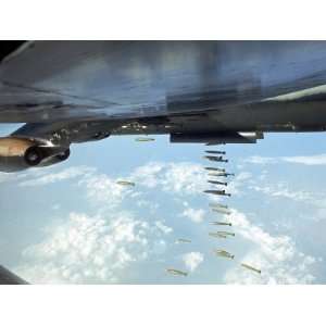  American B 52 Dropping Payload of Bombs onto Viet Cong 