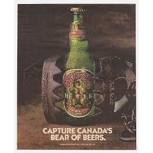    1985 Grizzly Beer Bottle in Bear Trap Print Ad