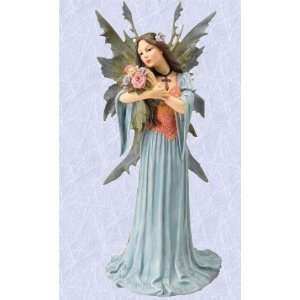  medieval fairy with gothic cross and flowers sculpture 