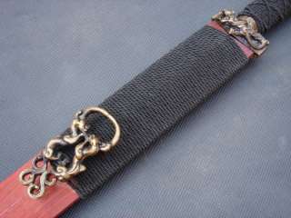 Refined copper harness and scabbard tying