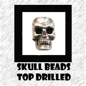 SKULL Beads, lot of 4 vertical drilled  