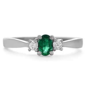  0.36 Ct Platinum Oval Emerald and Diamond Ring: Jewelry