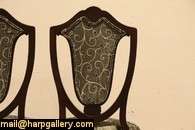 hand carved pair of side chairs dates from the Art Nouveau period in 
