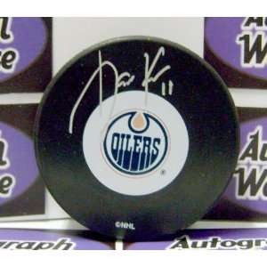 Jari Kurri Autographed Hockey Puck (Edmonton Oilers)