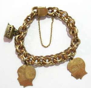 LARGE ANTIQUE GOLD FILLED CHARM BRACELET WITH CHURCH CHARM & TWO 